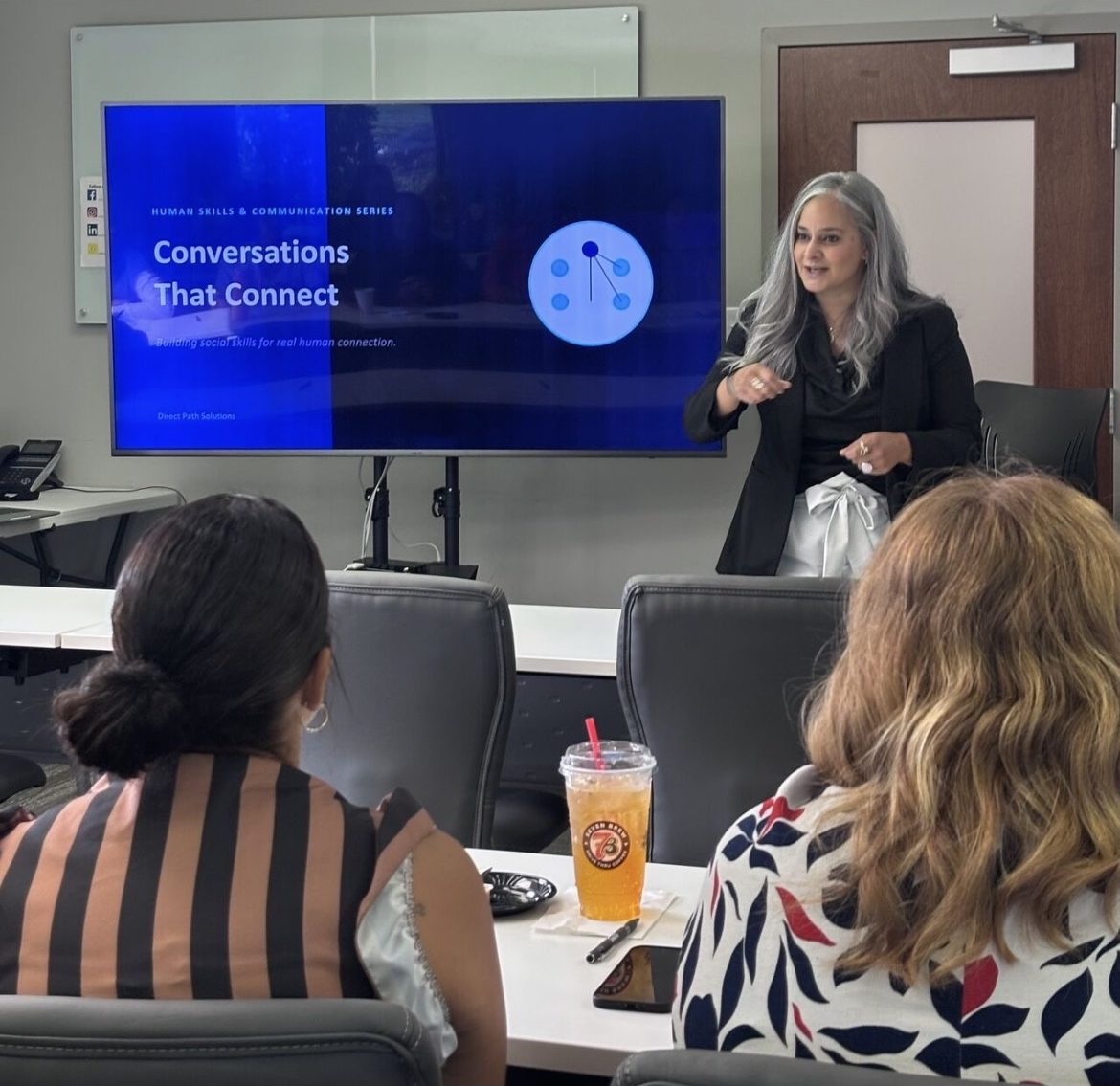 Dalia presenting the Conversations That Connect training to a small group